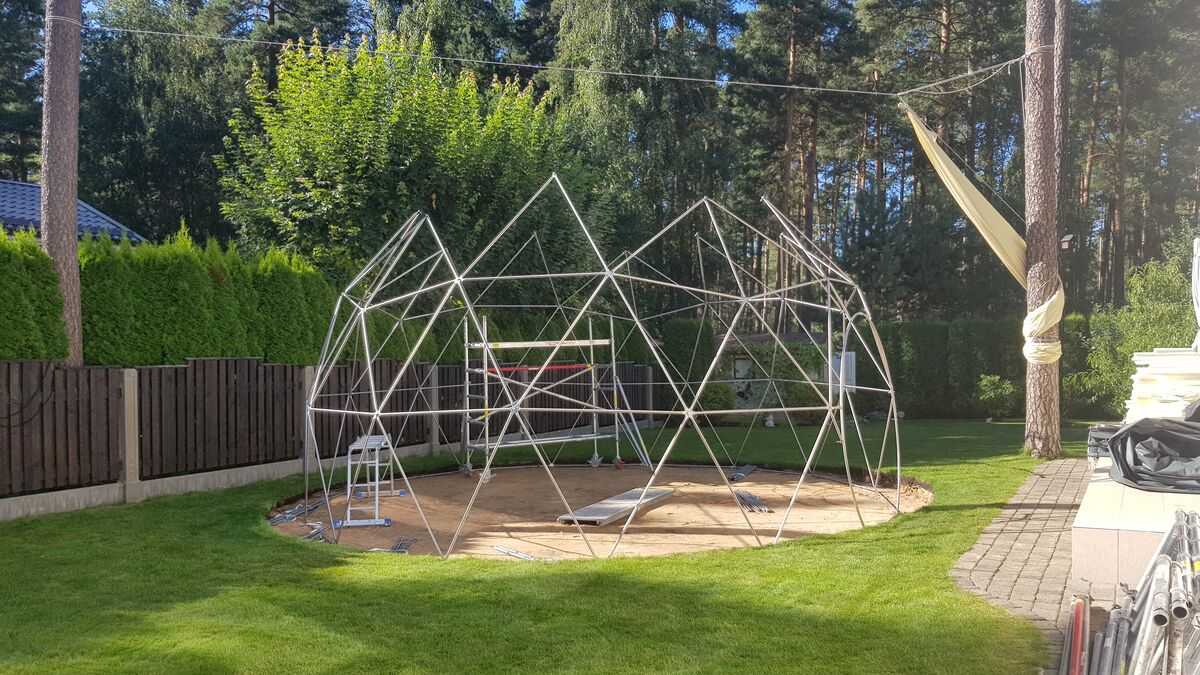 Completed geodesic dome frame at sunset